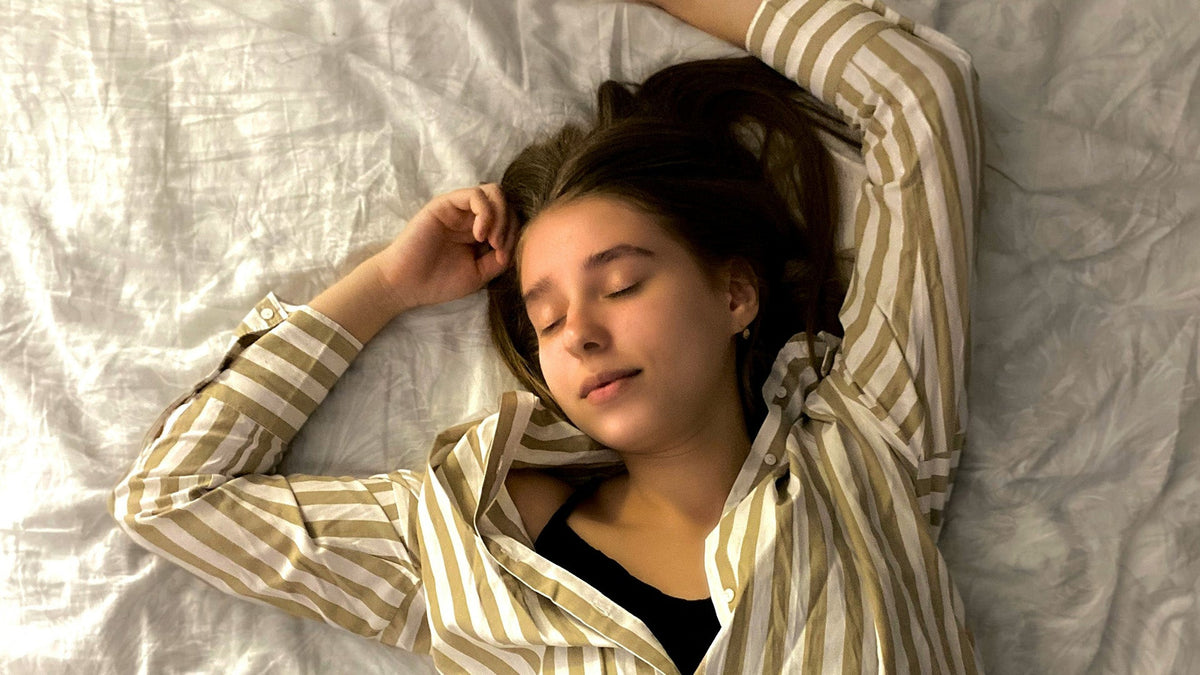 Young Woman sleeping after smoking nine realms 10-oh-hhc flower