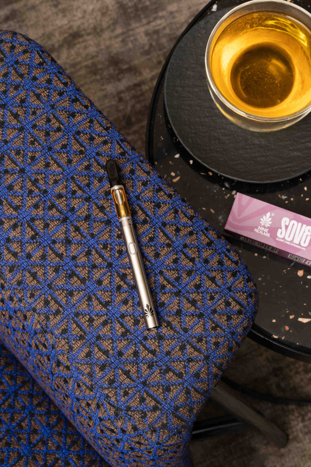 Nine Realms SOVE Cartridge on Sofa