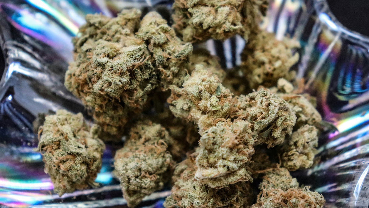 A bowl full of Nine Realms THC and CBN flower buds