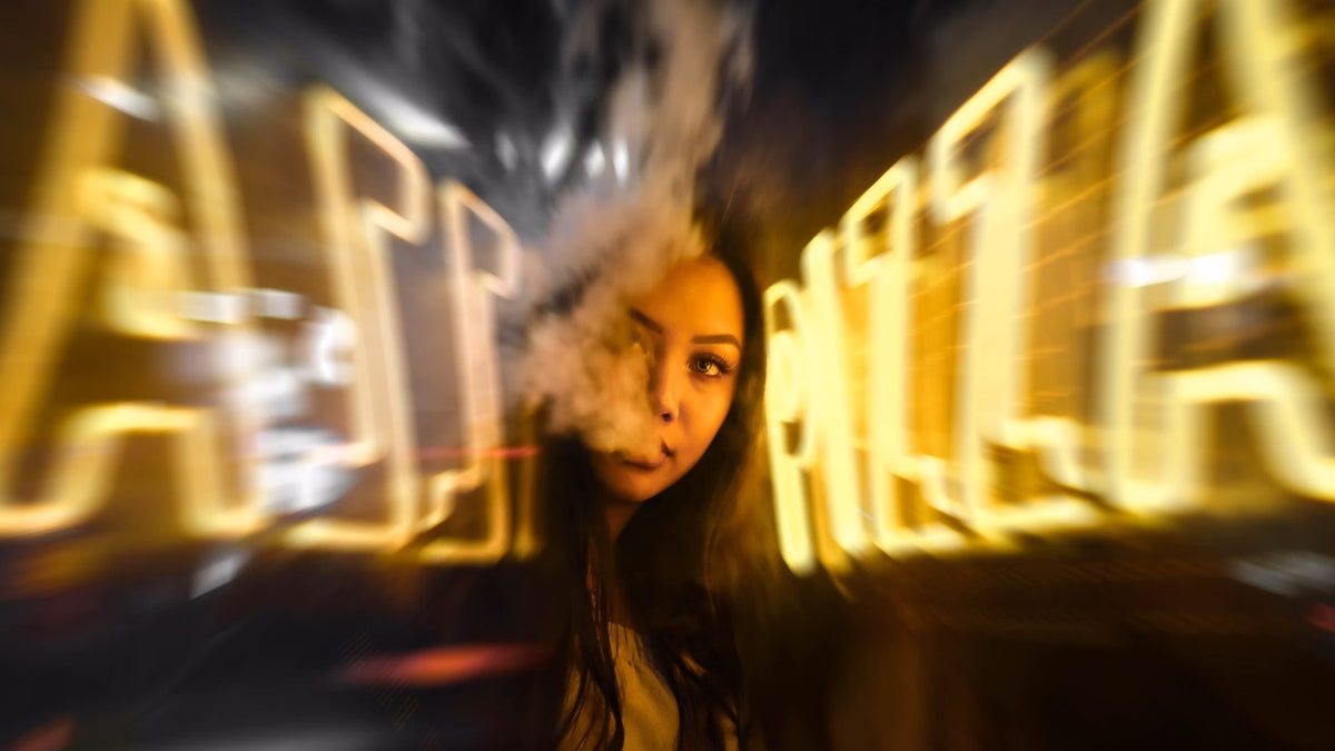 Woman Using Nine Realms THCP Vape 