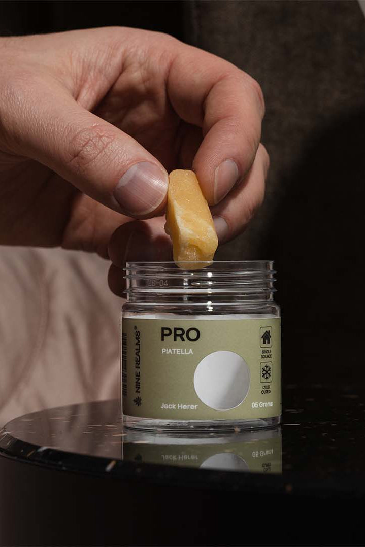 Nine Realms T9HC Piatella Hash on a black marble cupboard