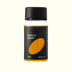 A 60ml bottle of Nine Realms SVART Vanilla THC Syrup with a black cap and black label featuring a prominent orange oval graphic, set against a solid off-white background.