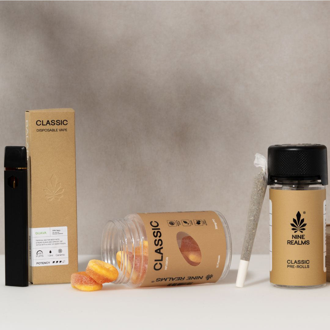Nine Realms classic products bundle with gummies, vape, and pre-rolls on a white table